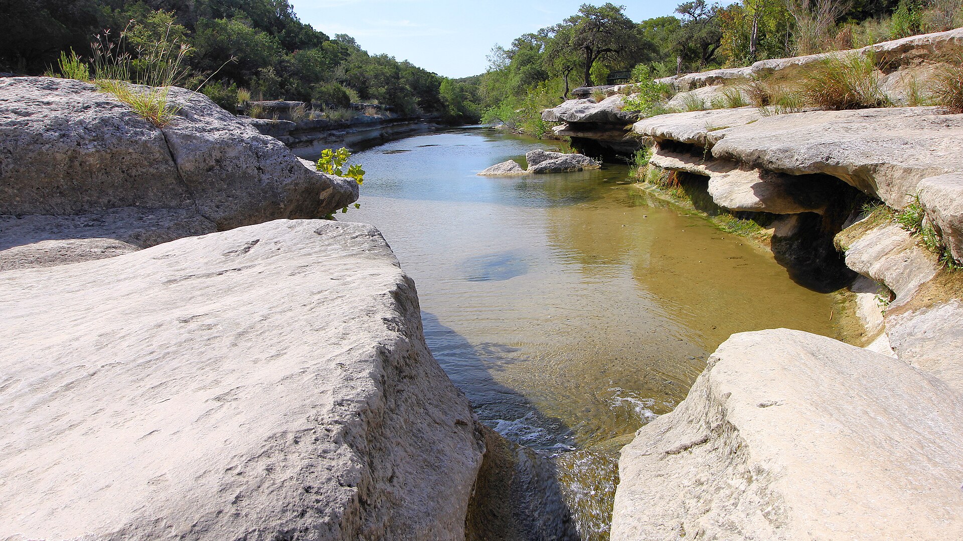 Bull Creek flowing between limestone ledges in Bull Creek District Park in northwest Austin, Texas